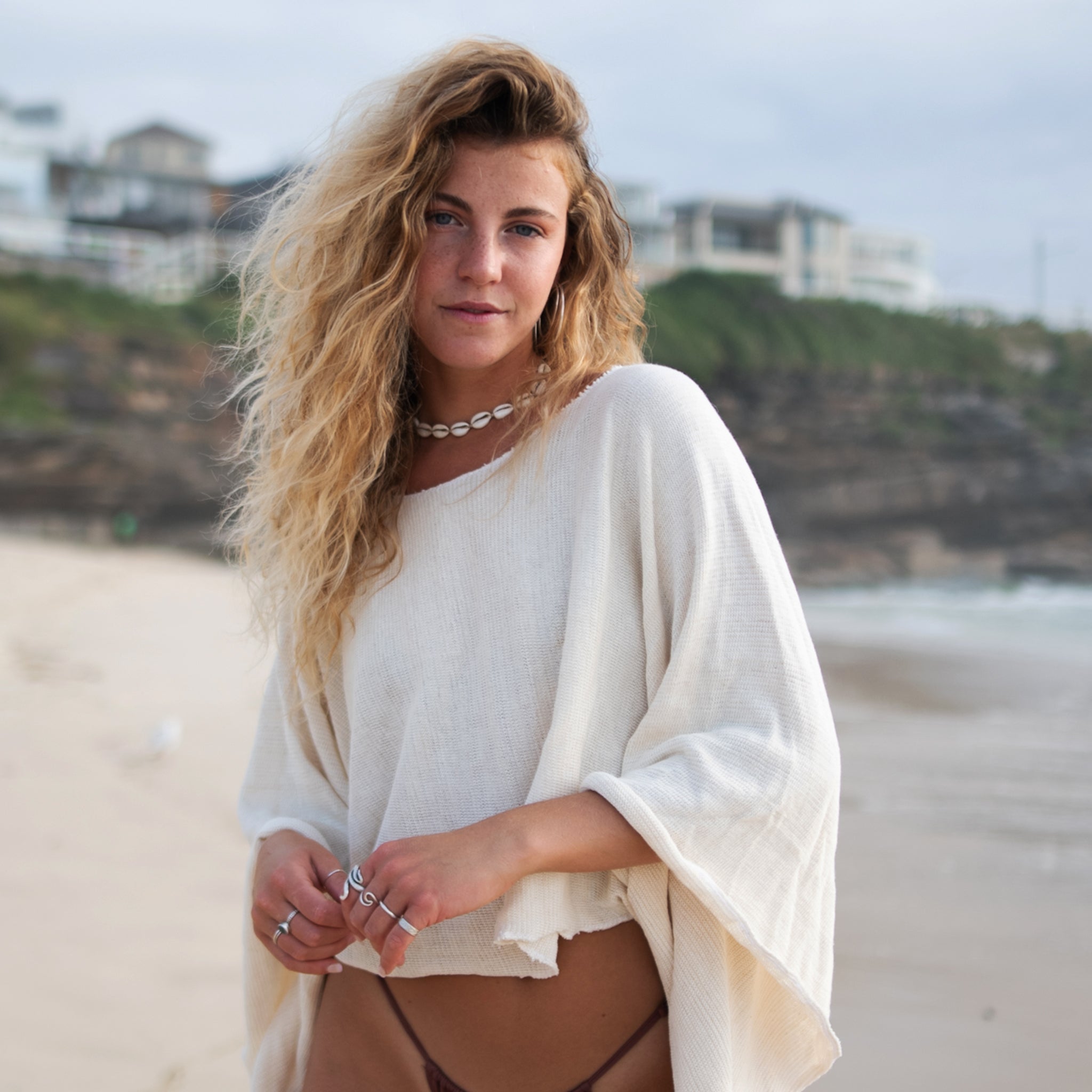 The Shrug in White Natural
