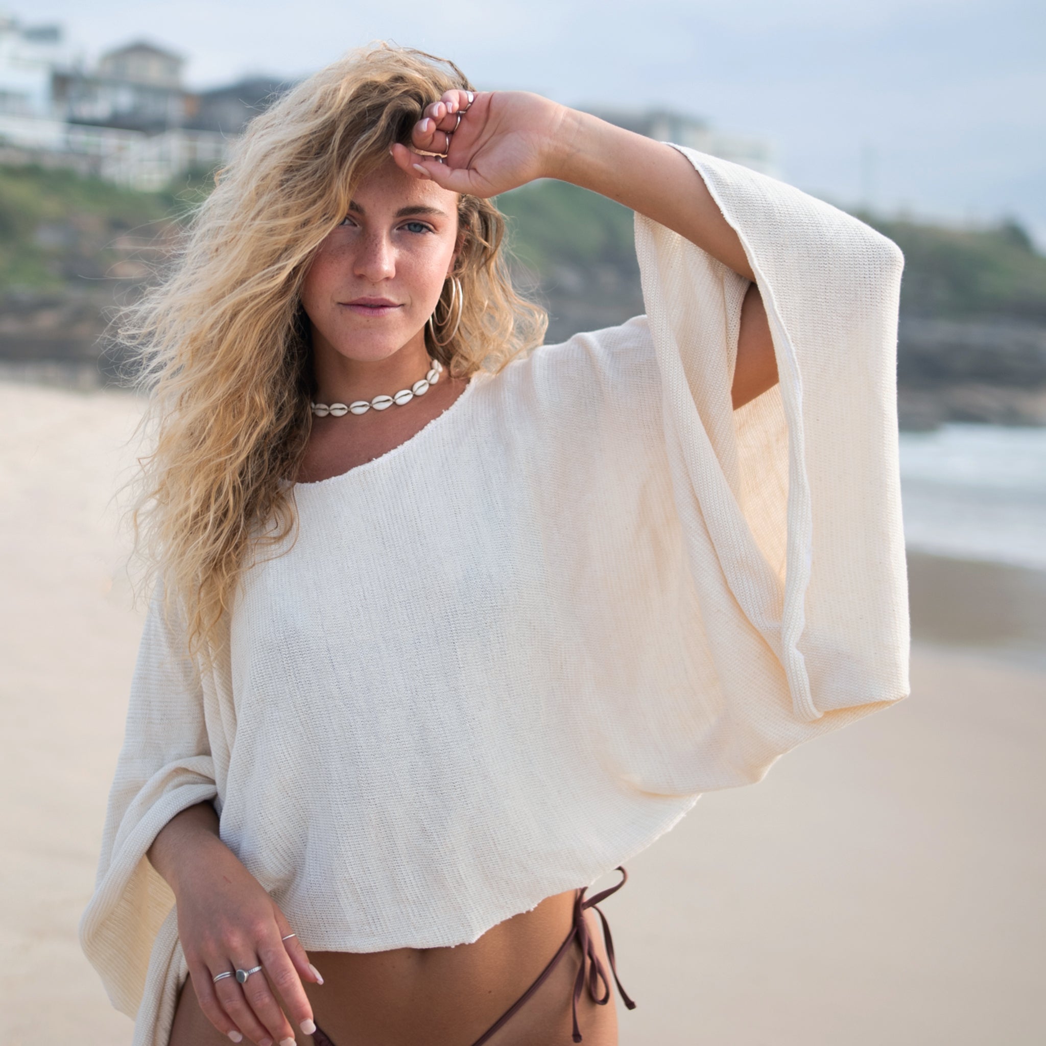 The Shrug in White Natural
